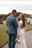 I wore this as my wedding dress earlier this month and absolutely loved it!  This was a second wedding, so I was apprehensive about anything too "bridal" but also wanted to be special.  This was better than I could have imagined!   It is fully lined and even though it is fitted, it is forgiving and very comfortable. - Laura A.