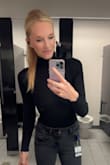 This is a nice, quality body suit. I ended up wearing mine without anything over it. - Carrie L.