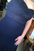 I absolutely am in love with the dress, it looks exactly like what is pictured. But if you are on the shorter side, like I am, then it will be quite long. In addition to, having bigger hips or a little tummy, it will be noticeable through this dress so I would either size up or wear something underneath. On me the large fit, but the zipper was hard to get up. However, you don't have to wear a bra if you're comfortable with that because the dress provides enough support for the girls. But overall, it's made well and I am pleased with it for an upcoming wedding. - Alina C.