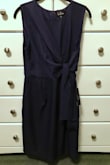 The top and bottom are a bit disproportionate, so the bottom is perfect, but the top is too big. If I go a size down, the bottom is too small and the top is perfect. So I have to get it tailored. Overall though, it's a really cute dress, good material, the zipper is solid, and I can wear this for more than just the bridesmaid outfit I bought it for. Yay! - Aspen M.