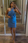 The dress fits well from the bust and overall looks good. However, the shine of the dress is not as shown in the picture, but I am okay with it. And the zip of the length in the back is a little longer, so I had to fix that too by stitching it up. But the quality of the fabric and everything else is very good. I am keeping it. - Nidhi M.
