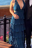 The dress fit perfectly for the most part! did have slight spillage, but I think it could've been prevented with body tape! received sooo many compliments - Kenna E.