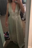 I ordered this for prom and it's sooo pretty!! Top is more revealing than photo but I'll get it to work :)) also may be more silver, it depends on the lighting - Mackirox21 M.