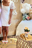 I purchased this dress for my bridal shower, and it was absolutely stunning! I gave it 4 stars because it's not very comfortable and was a little big on me. I could've gotten away with a small. It served its purpose, though! - Makayla B.