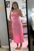 The dress material feels great and I was debating whether to order the small or medium. I went with the small and it fit amazingly! - Juliana M.
