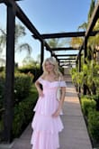 Omg I loved this dress! It was so beautiful. It was perfect for a wedding. The pink color is true to image and so beautiful. If you are smaller in the chest part, the part under the shoulder/chest ruffle is going to run pretty big. I had to wear a push up bra to fill the empty space, I would definitely size down, maybe even 2 sizes! But I got so many compliments! I loved this dress, it was beautiful! - Elisa P.