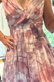 Unfortunate, large, dark purple circle right on the left breast area. Impossible to wear, and Lulus won't let me return it because it's been 21 days. It has not been worn. - Claudia S.