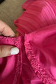 The dress arrived damaged. The stitching was coming apart and the seams were unraveling in the right breast area. The front of the dress was also not made well. The top front puckers out and curls outwards and is too loose at the top while the rest of the dress has more of a normal fit. Not a consistent fit. This dress unfortunately was made more like a $10 or less. Cheap feeling, came damaged, and didn't fit right. Was hoping to wear this for my best friend's rehearsal dinner but will find another dress somewhere else. I used to buy Lulus in college and I am only 6 years out from college but their quality has gone down significantly. - Charles C.