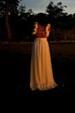Such a cute spring/summer dress. I got it hemmed and was still able to keep a good amount on the bottom tier on. It held up perfectly all night. - Taliyah P.