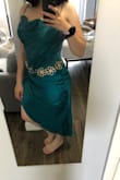 This dress is absolutely perfect! I love the color and the quality of the fabric - it feels so well-made and fits me beautifully. It makes me feel elegant and confident, and I already can't wait to wear it for my husband's birthday party! Definitely one of my new favorites =( - Denise G.