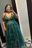 The dress is beautiful, but it runs a bit small. I recommend sizing up. My dress had a stuck zipper. I had a hard time zipping it up, but was able to get it all the way up. Shorties like me (l'm 4'11) and had to get the dress hemmed. Overall, I loved how I looked in this dress and felt very pretty wearing it to a wedding. - Maritza D.