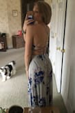 This dress is beautiful!! Definitely going to need it hemmed at the bottom.. with 3-4 inch heels on it still swoops the ground but everything else about it fits perfect!! Fabric and material is better quality than I imagined. In love with the back!! - Michelle R.