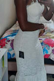 I wanted a simple dress for my courthouse ceremony and fell in love with this! She fit like a glove! If you have a booty, I'd probably size up. If you have a larger chest, I'd probably skip this one. I also recommend putting it on over your head and not stepping into the dress. - Brionna J.