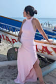 Dress was beautiful. I would typically wear a medium but ordered a large, and I'm glad I did. I wore spanx shorts to smooth everything out, and I think it looked great. I don't have a large chest so a sticky bra worked fine for me. Great dress! - Stephanie C.