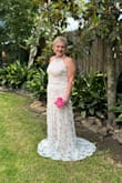 This is for a second wedding. It was absolutely beautiful little iridescent sequins on it; the Neck detail was beautiful. This was something I normally would not wear, but took a chance and it was absolutely perfect. I felt beautiful in the dress. - Amy M.