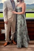 I purchased this dress for my brother in-laws wedding, and it was perfect! I did have it taken up a few inches; I'm 5'2, every dress I tried on was too long. Aside from the length, it was a perfect fit. I received many compliments. - Lindsay C.