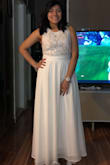 Loved the dress !!! I felt beautiful in it. That night I received so many compliments. I ordered size small. It felt too tight. I thought the top of the dress stretched out but it doesn't so I ordered size medium. Perfect fit ! Super comfy. - Aylin V.