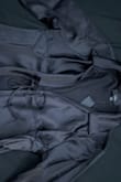 {Translated by a lulus employee}

It's very pretty. The fabric looks very warm. It's a little small in the arm area, one size up would fit you perfectly. - Paola P.