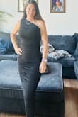 The fit is perfect, the ruching brings in the material to fit your curves perfectly. The material is rich and good quality, extremely comfortable, kind of slinky. I love the tight fit right to the bottom as looks very classy, but does make it hard to take a long stride. I pinned up one side later in the night just to below the knee so I can move my legs better to dance for the wedding- looked good! - Kimberly D.