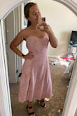 This dress is very cute and as pictured. The only downside is that the cups have zero structure. - Belle H.
