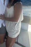 This romper is a summer must-have! The beige linen fabric is soft, light, and airy, making it incredibly comfortable and perfect for a relaxed, chic look. The size small fits true to size, with a flounce detail that adds a cute, stylish touch. Absolutely obsessed, highly recommend for effortless elegance! - Ruth W.