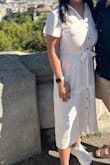 This dress is a summer dream! The beige linen fabric is light and breathable, making it perfect for warm days, and the size M fits beautifully with a flattering silhouette. The button-front design adds a touch of elegance, and it's so comfortable to wear. Highly recommend for a chic, effortless look! - Ruth W.