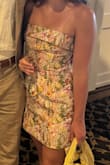 This dress was perfect! I thought the colors were great as a guest at a summer wedding. The back ties helped the dress stay snug up top and the strapless top didn't move at all! I can't wait to wear it again. - Kara B.
