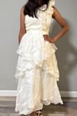 Beautiful dress. Make sure to order your true size, not stretchy. - Anali G.