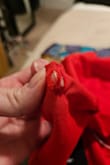 I really love the style of this dress and the color too; and that's saying a lot because I don't normally wear/feel confident in red. 

However, after just trying it on, when I went to unbutton the top button, I couldn't get it undone. It's because the material had already spliced around the button hole due to be sewn extremely poorly with no buttonhole stitching to reinforce the edges.
There were lose threads everywhere, and on the left arm, the lining was sewn approximately ¼" outside the bodice.

When I found Lulu's about 6 years ago, I was so excited that they offered unique,  stylish clothes, in a variety of sizes, at what I felt was a reasonable price. However, that is not the case anymore. The prices have gone up, and the quality has decreased substantially, as evidenced by issues such as this in my last several purchases from them.

At this point, I consider them to be a fast fashion company in terms of the quality, but certainly not the price point. I will not be patronizing them anymore. - Katey C.