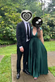 This dress was a showstopper! The green color is incredibly vibrant and elegant perfect for a black tie wedding. The pleated bottom was super flattering, especially for curvier body types, and it added such beautiful movement to the dress.

If you love a deep V neckline, this dress delivers, but I definitely recommend wearing fashion tape or pasties since the back is just straps and doesn't work with a traditional bra. For those with a larger chest or broader ribcage, consider sizing up to ensure a comfortable fit, especially around the lower back.

The material has a nice weight to it, and the length is generous it nearly hit the floor even with heels, but it looked gorgeous and flowed so well. I have brown hair, and the color pairs beautifully. I also loved the subtle shimmer throughout; it made the dress look even more elevated. It was true to color and received a ton of compliments.

Highly recommend if you want something elegant, unique, and flattering! - Christina D.