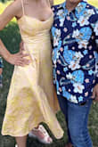 I typically never buy yellow, but this dress looked adorable, so I took a chance. It fits really well, but a little tight for me on top because C cup. Otherwise loved it and got a lot of comments on the dress at the wedding. - Chasity L.
