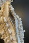 I'm very disappointed in the quality of this bag. I purchased it for a special occasion, and within hours, the beads were falling off, the bottom seam ripped out, and the chain broke. - Heather B.