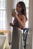 I received so many compliments on this dress, and I've only wore it out twice.  I can go braless in it, it doesnt show any panty lines, and the color would be perfect on any skin tone.  I wore flat with it for comfort because the first time, I was hosting my best friends bridal shower, and it was not too long.  If you were any shorter than me though, you might need some wedges. - Brandy R.