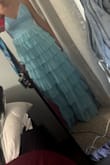 The quality of the dress is nice, and I liked the style. I would say it looked a little brighter in person. Also, it fits a little big on the sides for me, but it seems to be a size small. I wish they offered it in an extra small. - Shayla P.