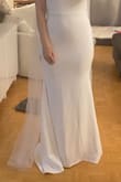This dress fits great, is not see-through. I did return it because I decided to wanted a poofy wedding dress. I got size Medium, and I am usually a size 6-8. I do have a bigger bottom and thighs, and it was a little tight but wearable. I am 5'6, and the length is perfect for that height if I were wearing flats or maybe a 1 inch heel! - Shanon S.