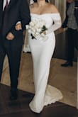 I bought this dress for my civil wedding ceremony! It is simple but so beautiful!
It stays up nicely and hugs your curves. Thicker material with lining. I highly recommend it! Im
Normally size 10/12 and large fit, but was a bit snug. If any bigger, I would size up, or if you want a bit looser fit. - Alaina A.