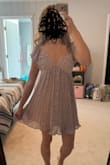 I really wanted to love this dress. The design I think, was cute & very floral. However, the quality is not all there. The zipper gets stuck halfway through & it's hard to zip up by yourself. I ordered an XXS at first. It felt like it fits, but the zipper won't get past halfway through, so I thought I needed to size up. So I exchanged for an XS, but same thing with the zipper. It didn't look flattering to me. The chest area was bigger. An XXS would've been a better fit, but the zipper is what sucks! I couldn't convince myself to keep it, so I am returning both, and still have to pay $5.95 shipping to return. Disappointed first-time customer of Lulus :( P.S. the photos I attached are both the XXS and the XS, and the XS didn't look great on me at all. - Patrixia C.