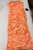 This dress is not pastel, or even light orange/coral. It's FLUORESCENT orange. Definitely not the vibe I'm going for. - Sonja L.
