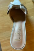 These shoes are absolutely darling, but I was so disappointed to see that part of the lining of the sole had already come unglued straight out of the box. I bought these for my wedding, but I'm a little worried they won't hold up throughout the day if the construction is that poor. - Paige B.
