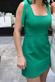 Wore this to a green-themed bridal shower & got several compliments. Ordered a small and medium, but the small fit best. Was surprisingly comfy with a little stretch. Only negative is that you need someone to help tie the bow straps evenly because it's too difficult to do yourself if no one is there to help you. - Janine O.