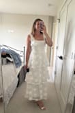 Loved this dress. It is perfect straight from the package. Great fit, nice quality, and hand to find something comparable at this price point. I wore for my daughter's baptism. I did end up taking the straps in a bit so it didn't look as big on the shoulders as pictured when trying on initially. - Samantha G.