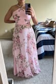 Very flattering dress! Especially if you have a mid sized bust like mine. It flares well and was a fantastic fit for the occasion. Runs a bit long but with heels it was perfect. - Varshini V.