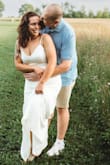 I bought this dress for our engagement photos, and it was perfect! Very comfortable with some stretch and very well made. The length was also just what I wanted, even without wearing heels. If I were going to get married in the summer, on the beach, I would even consider this being my dress. - Ashley L.