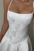 I love this dress! I'm a bit short so the dress is long for me. I'll get it altered though. The quality is amazing, I would definitely need help putting the dress on though, since I want the back to be perfectly aligned. I'm super excited to wear it for my wedding day! - Annabelle A.