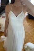 It is see through, and big in the chest/waist/straps. The straps are not adjustable. The length is too long. I am 5'6 and it is too long with heels on. - Shanon S.