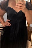 This dress is cute, but could use some better material. I love the navy color and open back. However, it is a little tight around the shoulders. - Gracie W.