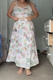 I saw a friend of my sister wearing this set and immediately fell in love- it's so difficult to find a skirt and crop set that looks good and fits a short frame and short torso, especially when you're busty. The quality of this set is beautiful, with thick fabric and gorgeous embellishments. Both the top and skirt have zippers and fit snug but not too tight. For me, the skirt hit at my ankles, which was fine! I would definitely recommend this set to anyone- it looks great on every body type and will last! - Adrienne W.