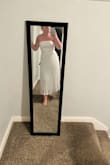 Bought for my engagement photos. Fits nicely. A tad bit on the tighter side on the top. Haven't taken pictures yet, but it looked very nice when I tried it on. I'm very excited about it as it's a good length and very flattering. - Brittney F.