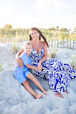 This dress was exactly everything I wanted for our family beach pics.  The quality is top notch.  It's double-lined and almost like a heavy linen material, so it doesn't cling weirdly and is nice and flowy.  It also has pockets.  I'm 5'7" and it came a bit above my ankle, but I expected for my height as all maxi dresses fit on me.  The tie-front at the bust is great for supporting larger-busted women.  I wore the sticky-boobs with it as the back is cut out, and the cutouts in the back are very flattering.  Rich blue color just as pictured.  The ties are very adjustable, so this is helpful for women of all bust sizes. - Leah S.