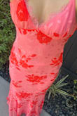 Fits beautifully! The color is much more bright in person, with the darker flowers leaning reddish and the pink only slightly coral. I will need to get it altered since I am on the shorter side (5'2) and even with heels, it is way too long. Double lined and not see-through at all. It has a beautiful, slight flare at the bottom, which elevates the dress! The straps are slightly flimsy, and there is slight rippling on the sides, but that wasn't an issue for me. Would highly recommend for any special event! - Tara M.